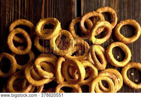 Russian Wheat Bagels With Salt On Dark Rustic Table