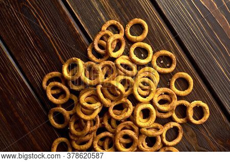 Traditional Russian Small Bagels On Dark Rustic Table Background, Top View