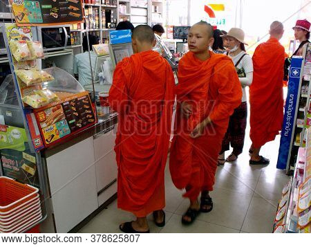 Chiang Mai, Thailand, April 25, 2016: Buddhist Monks Buying In A Store In Chiang Mai, Thailand.