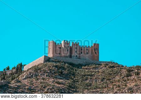 a view of the old Mequinenza castle, built on the top of a hill, in Mequinenza, Spain