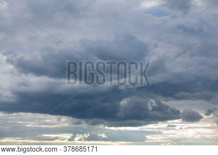 Nimbostratus Clouds With Sunlight In The Evening