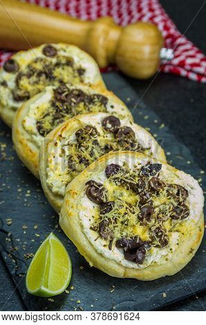 Delicious Lebanese  Food, Mediterranean Ricotta Sfiha, Olives Au Gratin With Cheese, In The Backgrou