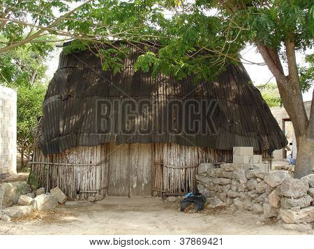 Typical rural home of the mayan descendants in the yucatan peninsula, this little towns are called 