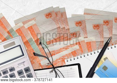 3 Cuban Pesos Convertibles Bills And Calculator With Glasses And Pen. Tax Payment Concept Or Investm