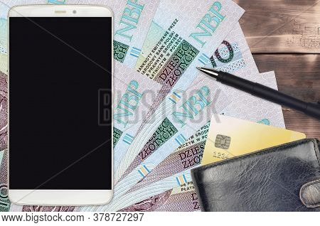 10 Polish Zloty Bills And Smartphone With Purse And Credit Card. E-payments Or E-commerce Concept. O