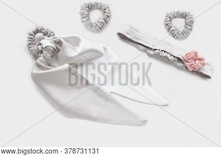 Slver Or Gray Hair Accessories With Textile Rose. Silk Scrunchy Isolated On White Backdrop. Flat Lay