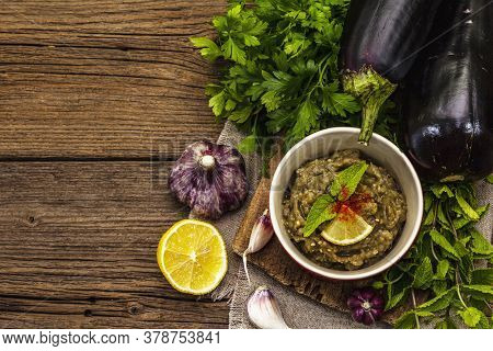 Eggplant Dip Baba Ganoush (mutabbal) Or Mezze With Ripe Vegetables And Fresh Herbs