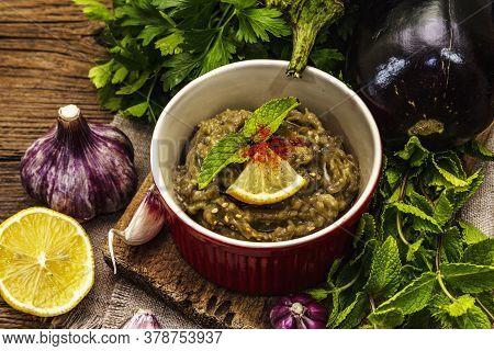 Eggplant Dip Baba Ganoush (mutabbal) Or Mezze With Ripe Vegetables And Fresh Herbs