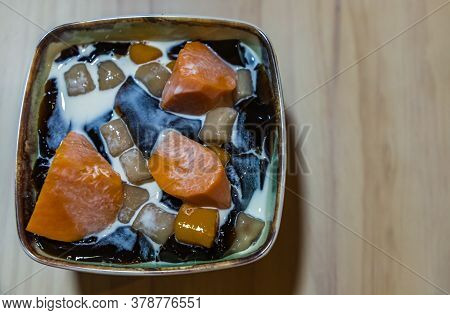 Traditional Taiwanese Iced Dessert With Grass Jelly, Taro Balls, Tofu Pudding, Sweet Potato Balls An