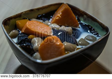 Traditional Taiwanese Iced Dessert With Grass Jelly, Taro Balls, Tofu Pudding, Sweet Potato Balls An