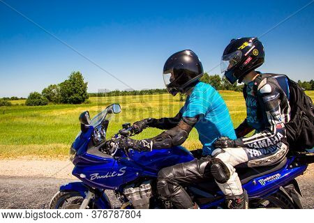 Senno, Belarus - 07.03.2015: Motorcyclists Ride The Road On A Sunny Summer Day