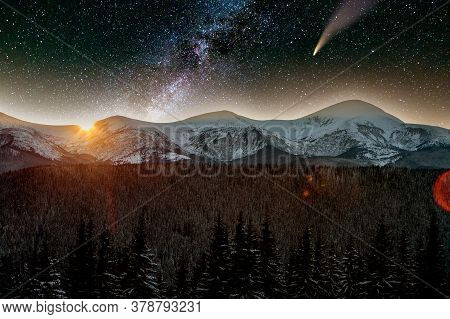 Surreal View Of Night In Mountains With Starry Dark Blue Cloudy Sky And C/2020 F3 (neowise) Comet Wi