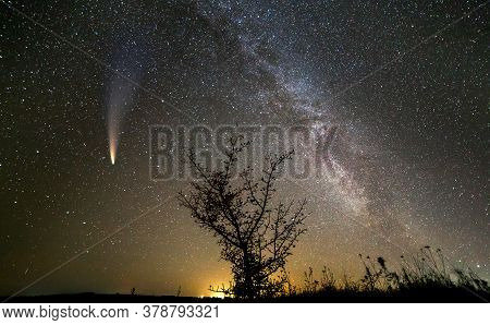 Night Landscape With Stars Covered Sky And C/2020 F3 (neowise) Comet With Light Tail.