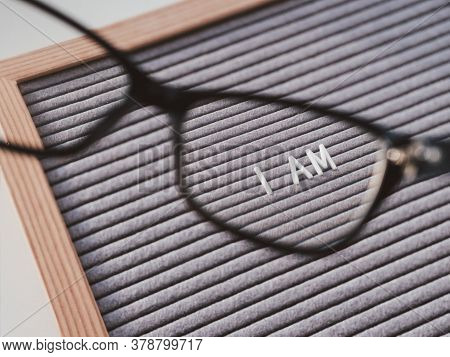 Top View On Letterboard With Words I Am Through Eyeglasses. Flat Lay Concept Of Psychological Self-r