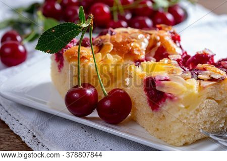 Fresh Baked Cake With Red Ripe Juicy Sour Cherry Or Kriek Berry Close Up