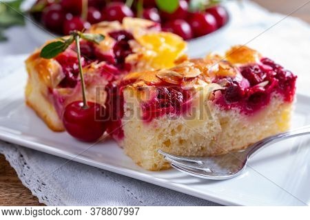 Fresh Baked Cake With Red Ripe Juicy Sour Cherry Or Kriek Berry Close Up