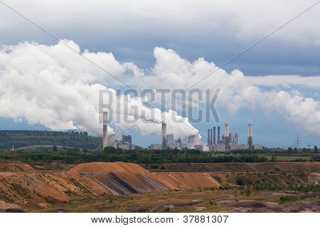 Thermal power plant against an open coal pit