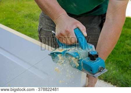Electric Planer For Processing Wooden Door Professional Using Craft Equipment With A Manual Planer