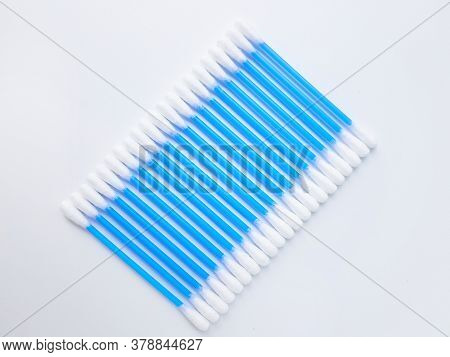 Ear Sticks With Blue Plastic On A White Background. Personal Hygiene And Self-care. Cosmetology And 