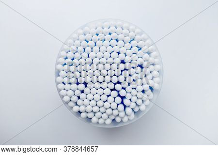 Ear Sticks With Blue Plastic On A White Background. Personal Hygiene And Self-care. Cosmetology And 