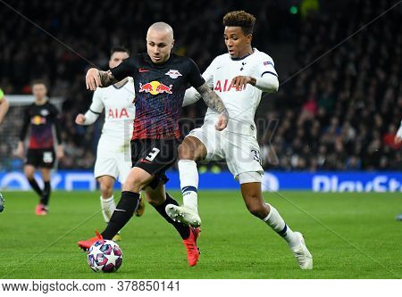 London, England - February 19, 2020: Angelino Of Leipzig And Gedson Fernandes Of Tottenham Pictured 
