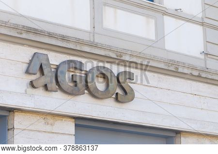 Carrara, Italy - July 10, 2020 - The Metal Sign Of The Agos Company. Agos Is An Italian Financial Co