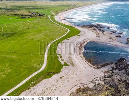 Aerial View Of The Beautiful Coast Next To Carrickabraghy Castle - Isle Of Doagh, Inishowen, County 