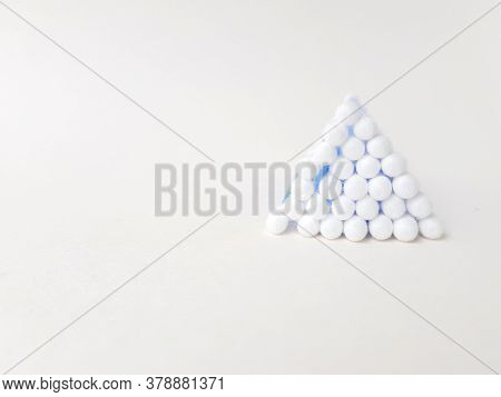 Ear Sticks With Blue Plastic On A White Background. Personal Hygiene And Self-care. Cosmetology And 