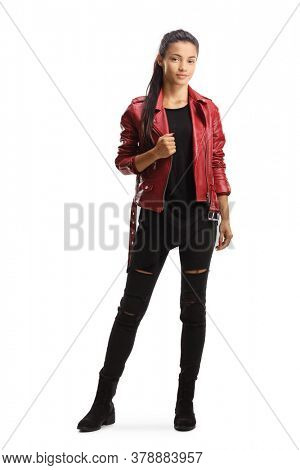 Full length portrait of an attractive young brunette in a leather jacket isolated on white background