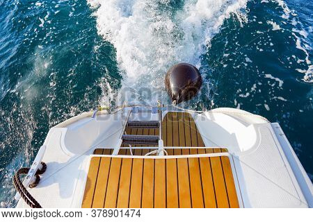 Water Trail Of A Cruise Ship. View Of The Sea Surface From The Stern Of A Sailing Ship. The Bubbles 