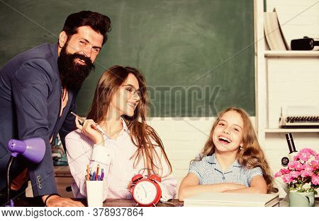 Tutor For Excellence. Extra Classes. Gifted Child. Little Girl Studying With Team Of Tutors. Home Tu