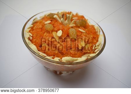 Gajar Ka Halwa, A Popular Indian, Pakistani Sweet Dish Dessert, Made Of Grated Carrot. Garnished Iwt