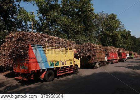 Yogyakarta, Indonesia - July 27, 2020 - Sugar Cane Trucks Lined Up In Front Of The Madukismo Sugar F