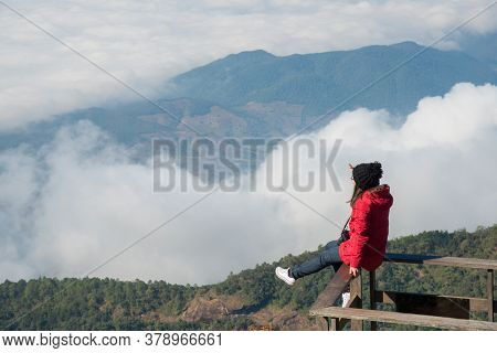Woman Sitting On The Wooden Terraces Of Kiw Mae Pan Boardwalk And Looking The Beautiful Scenery View
