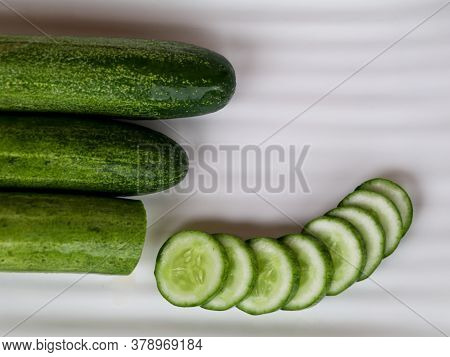 Fresh Raw Cucumber With Sliced Ones