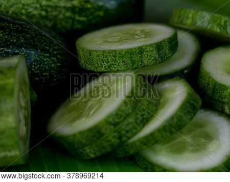 Fresh Raw Cucumber With Sliced Ones