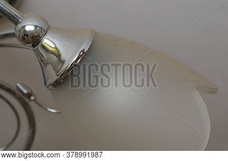 Dusty Glass Ceiling Of The Luminaire. Close-up Ceiling Luminaire Plafond With A Spider Web And Dirt.