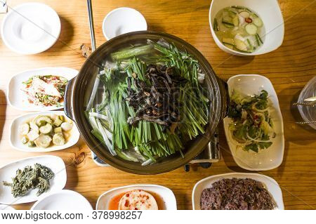 Korean Chicken Soup With Mushrooms And Chives.