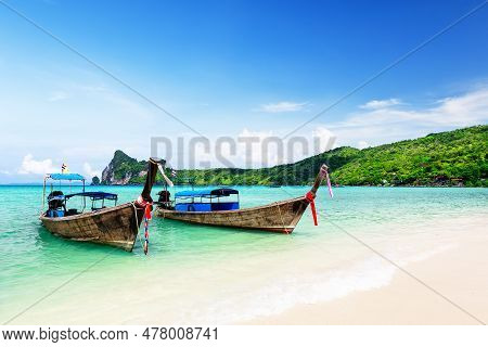 Thai Traditional Wooden Longtail Boat And Beautiful Sand Beach At Koh Phi Phi Island In Krabi Provin