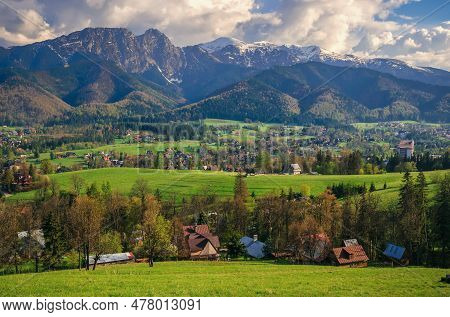 Beautiful Country View With Mountains In The Background. View Of The Tatra Mountains And Koscielisko