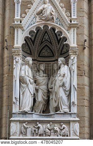 Firenze, Italy - 8 April 2023: Statue Of The Four Crowned Saints In The Tabernacle In The Exterior P
