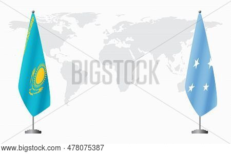 Kazakhstan And Micronesia Flags For Official Meeting Against Background Of World Map.