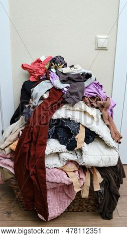 Pulling Clothes Out Of The Basket, Stop Motion Vertical Video. Sorting Men S And Women S Clothing Af