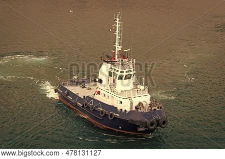 Tugboat In The Sea Water. Marine Tugboat In Sea. Photo Of Tugboat. Tugboat Outdoor