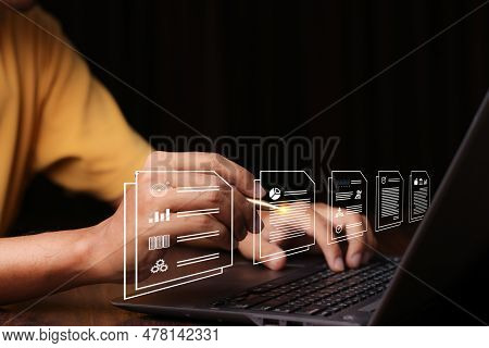 Document Management System (dms) Being Setup By It Consultant Working On Laptop Computer In Office W