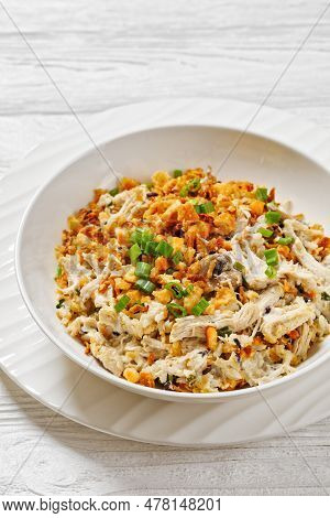Chicken Rice Casserole D Iberville Topped With French Fried Onion And Crumbled Crackers In Bowl On W