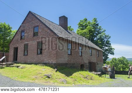 East Granby, Connecticut.  June 8, 2019. People Visiting The Old Newgate Prison Building On A Sunny 