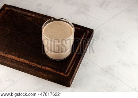 Glass Of Hushaf Or Date Milk On The Table. Delicious Cocktail With Dates Or Palm Fruits. Healthy Dri