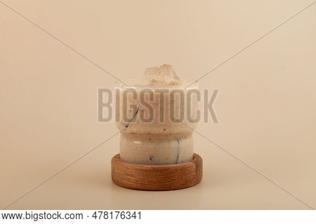 Hushaf Or Date Milk On Beige Background. Delicious Cocktail With Dates Or Palm Fruits. Energy Protei