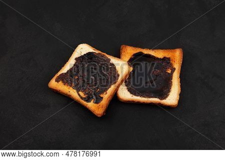 Wheat Crispy Toast With Brown Spread, Top View. Toasted Slices Of Bread For Breakfast. Dark Backgrou